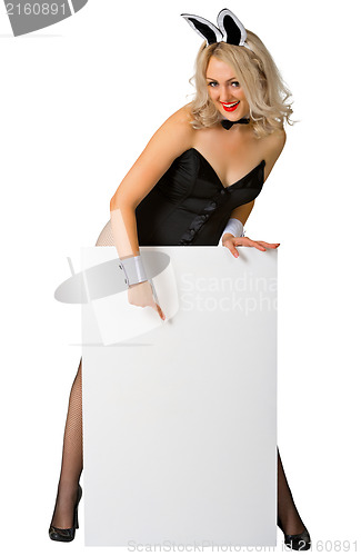 Image of Blonde woman in rabbit costume with a white poster