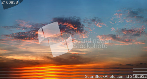 Image of Bright clouds at sunset light 