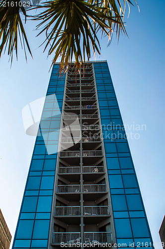 Image of modern glass silhouettes on modern building.