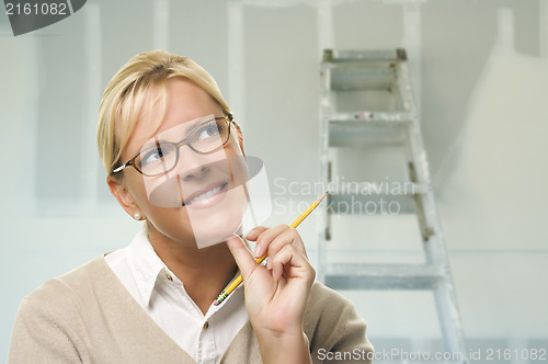 Image of Woman Inside Room with New Sheetrock Drywall