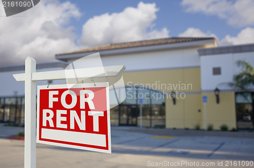 Image of Vacant Retail Building with For Rent Real Estate Sign