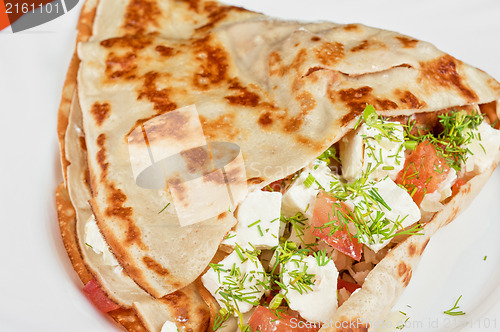 Image of pancakes with cheese and vegetables