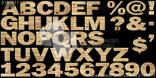 Image of Set - wooden alphabet on a black background