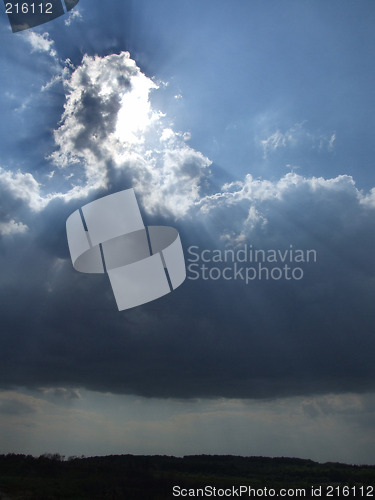 Image of White clouds and sun rays