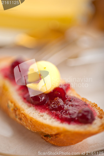 Image of bread butter and jam 