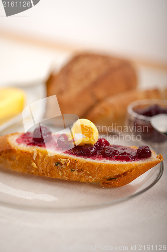 Image of bread butter and jam 