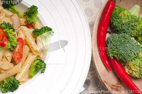 Image of Italian penne pasta with broccoli and chili pepper