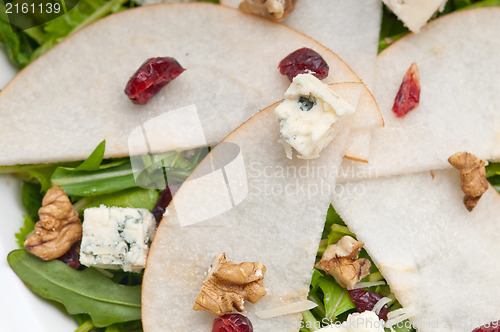 Image of Fresh pears arugula gorgonzola cheese salad