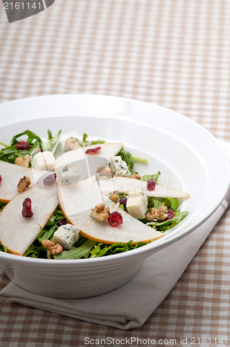 Image of Fresh pears arugula gorgonzola cheese salad