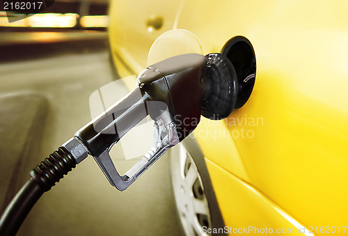 Image of car at gas station