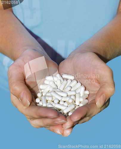 Image of handful of pills
