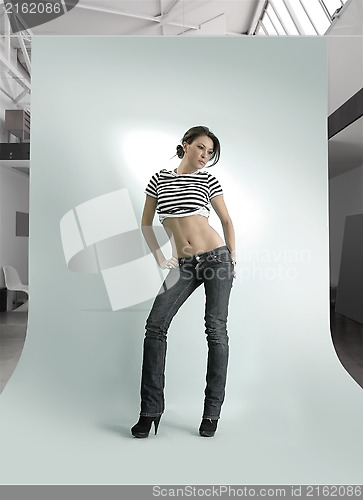 Image of young woman in the photostudio