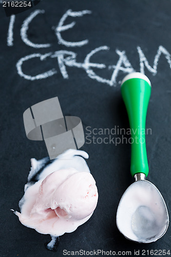 Image of Strawberry ice cream and scoop