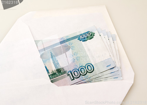 Image of White clear envelope with money