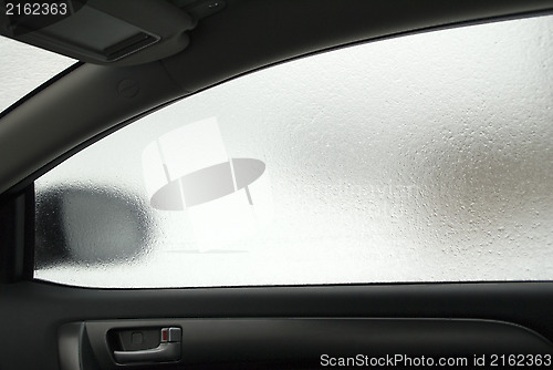Image of Frozen side window of the car