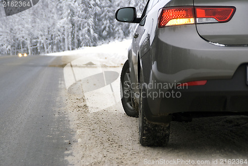 Image of Car on the forest road in winter