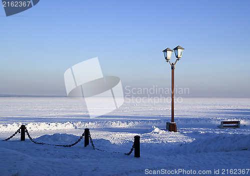 Image of Snowy pier of Onego lake in Russia