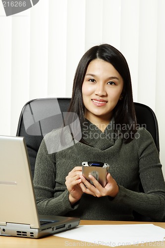 Image of Busy businesswoman