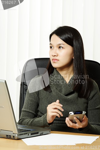 Image of Busy businesswoman