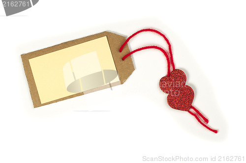 Image of Paper label with rope and red hearts