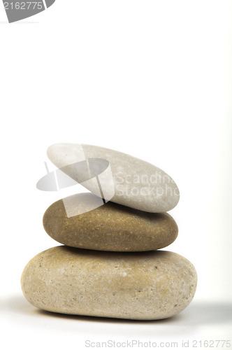 Image of Stacked stones white isolated