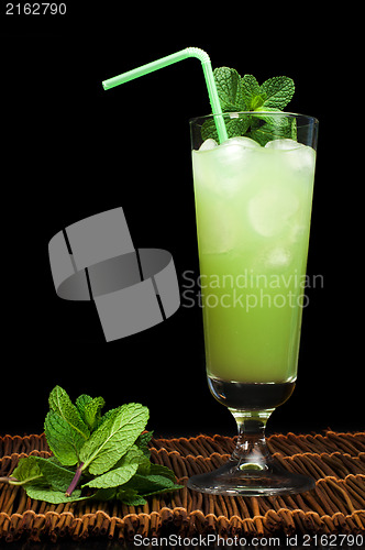 Image of Green cocktail with cubes ice