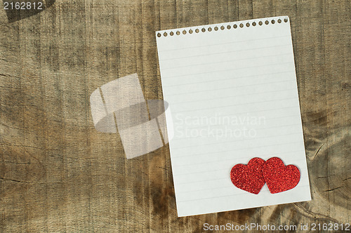 Image of Red hearts and white paper sheet