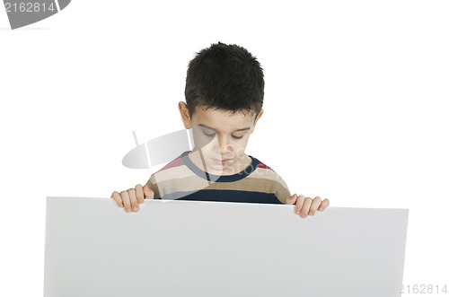 Image of Little boy holding a whiteboard