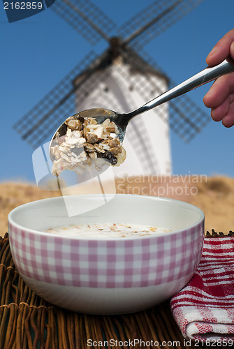 Image of Muesli breakfast in a bow and spoon