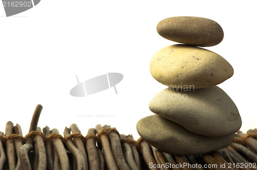 Image of Stacked stones on wooden base