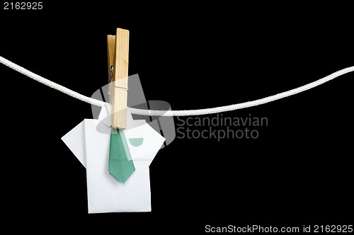 Image of Origami shirt on rope