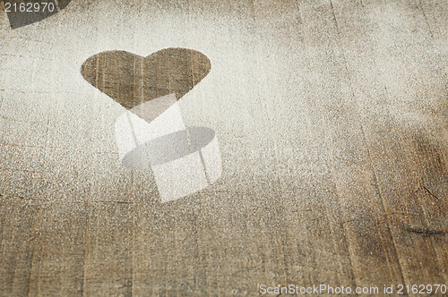 Image of Heart pattern on an old wooden board