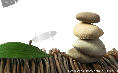 Image of Stacked stones on wooden base