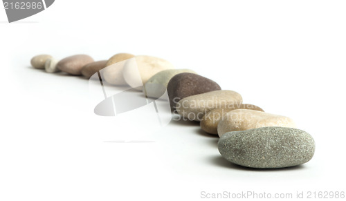 Image of Stacked stones white isolated