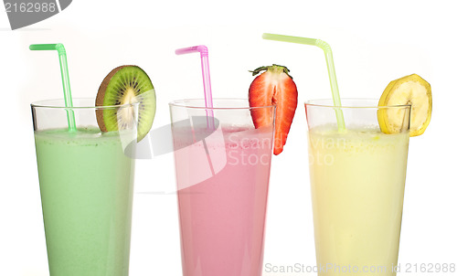 Image of Banana, kiwi and strawberry milk shake and fresh fruis