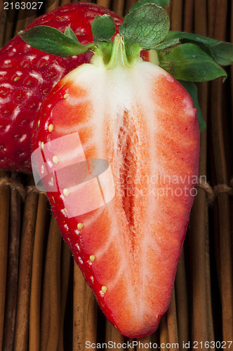 Image of Strawberries on wooden base