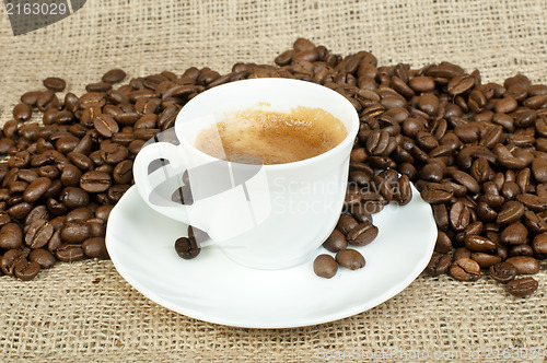 Image of Cup of coffee and coffee beans