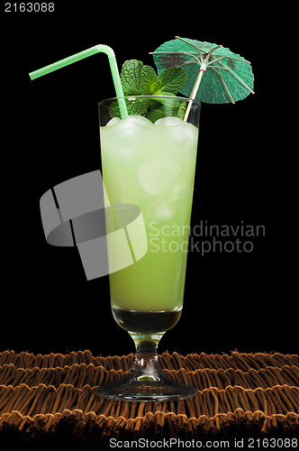 Image of Green cocktail with cubes ice