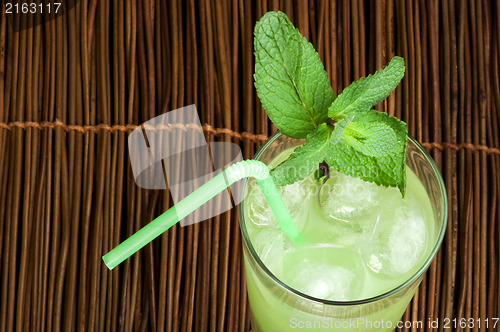 Image of Green cocktail with cubes ice
