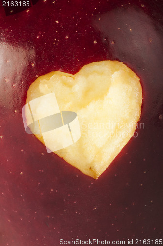 Image of Heart shape closeup carved in apple