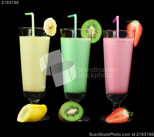 Image of Banana, kiwi and strawberry milk shake and fresh fruis