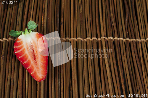 Image of Strawberries on wooden base