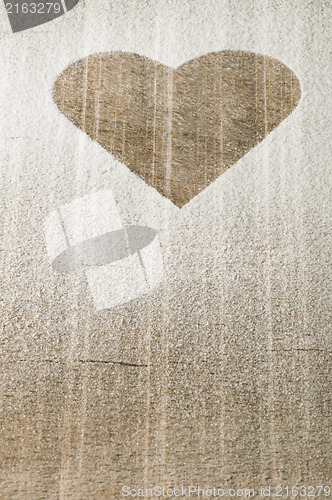 Image of Heart pattern on an old wooden board