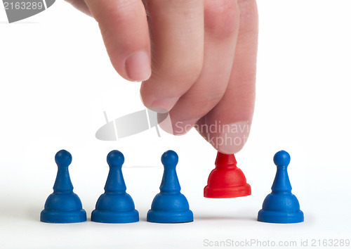 Image of Red and blue game pawns white isolated