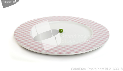 Image of Plate with peas white isolated