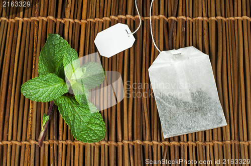 Image of Tea bag and fresh mint