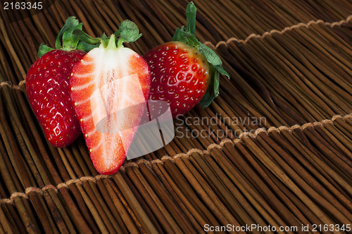 Image of Strawberries on wooden base