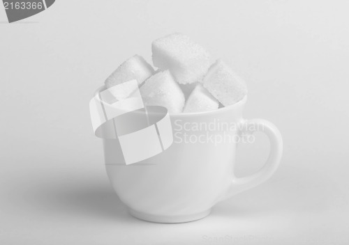 Image of Sugar lumps in cup