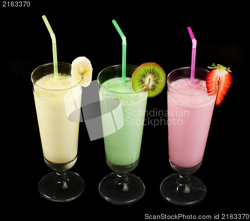 Image of Banana, kiwi and strawberry milk shake and fresh fruis