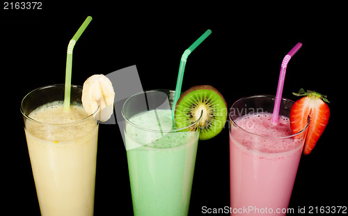 Image of Banana, kiwi and strawberry milk shake and fresh fruis